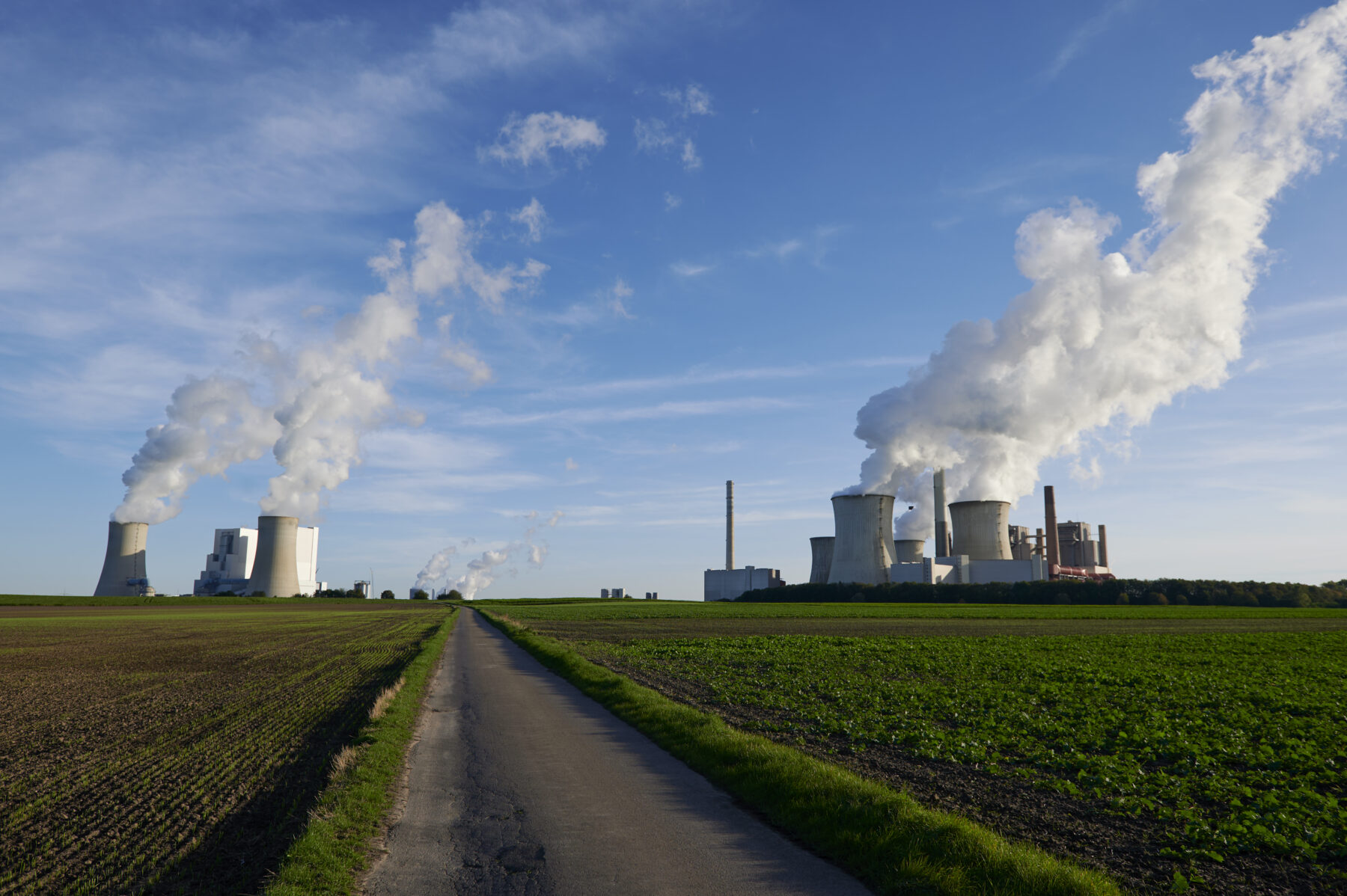 Two coal fired power plants, a third one in the background, Germany.